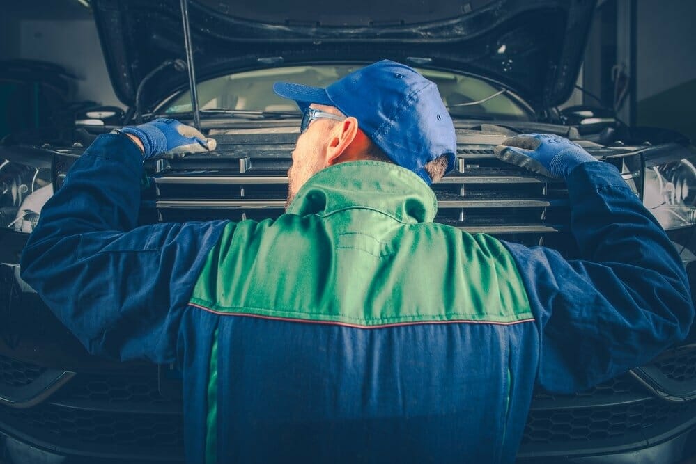 Engine Noises Listening by Professional Car Mechanic