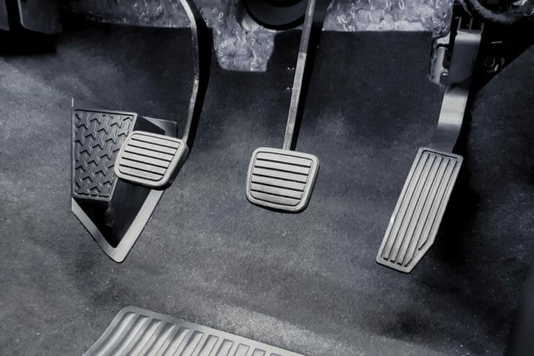 Clutch Pedal Stuck To Floor? (Causes & How To Fix)