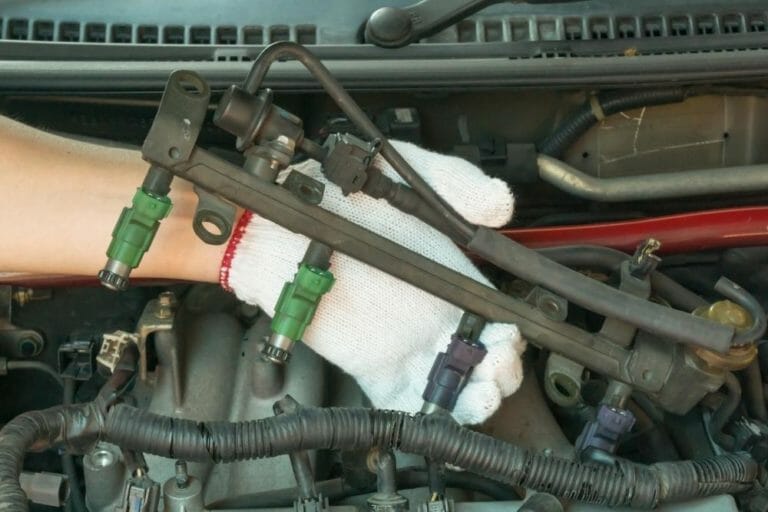 Leaking Fuel Injector Symptoms (Causes & Fixes)