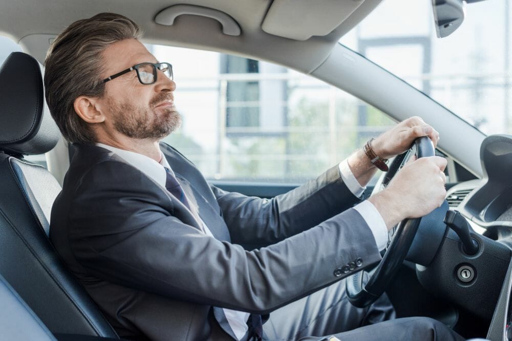 Steering Wheel Jerks While Driving 4 Causes & Solutions 