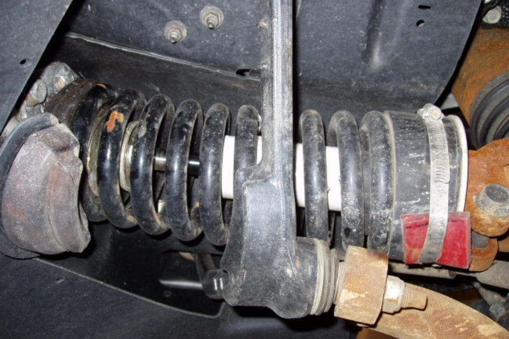 4 Symptoms Of A Bad Coil Spring (How To Fix And Replacement Cost)